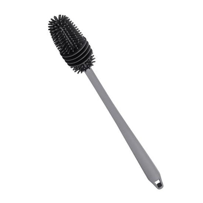 A silicone bottle cleaning brush with a long handle and a flexible, slender brush head with black bristles.