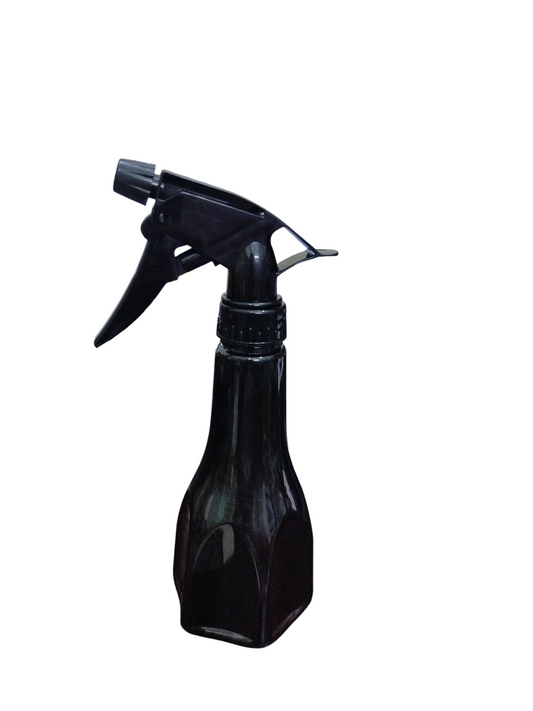 Black spray bottle on a white background